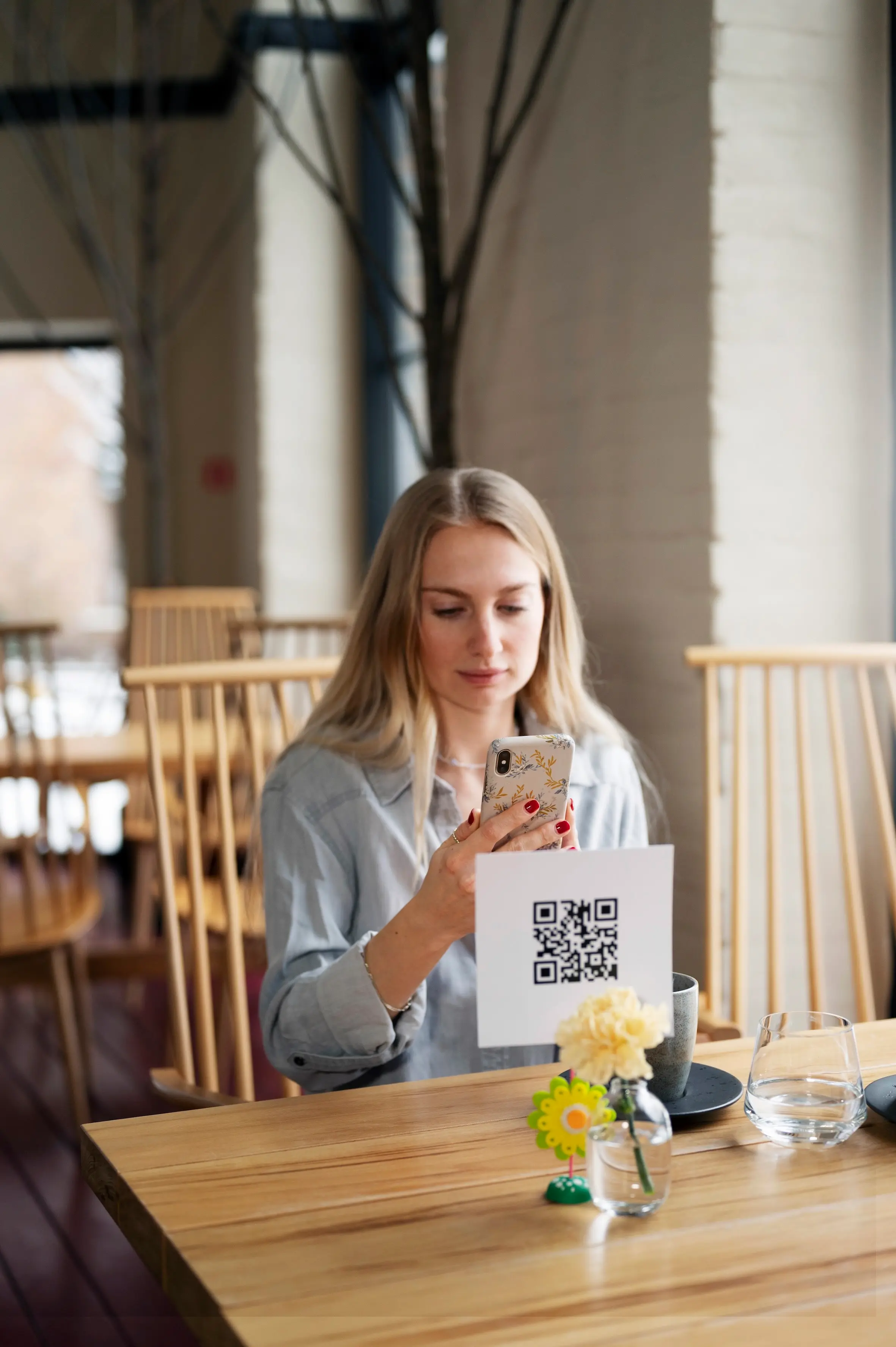 Person scanning QR code
